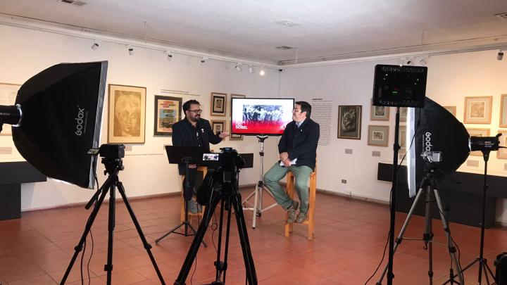 Imagen del detrás de cámaras de la producción mostrado las cámaras y focos